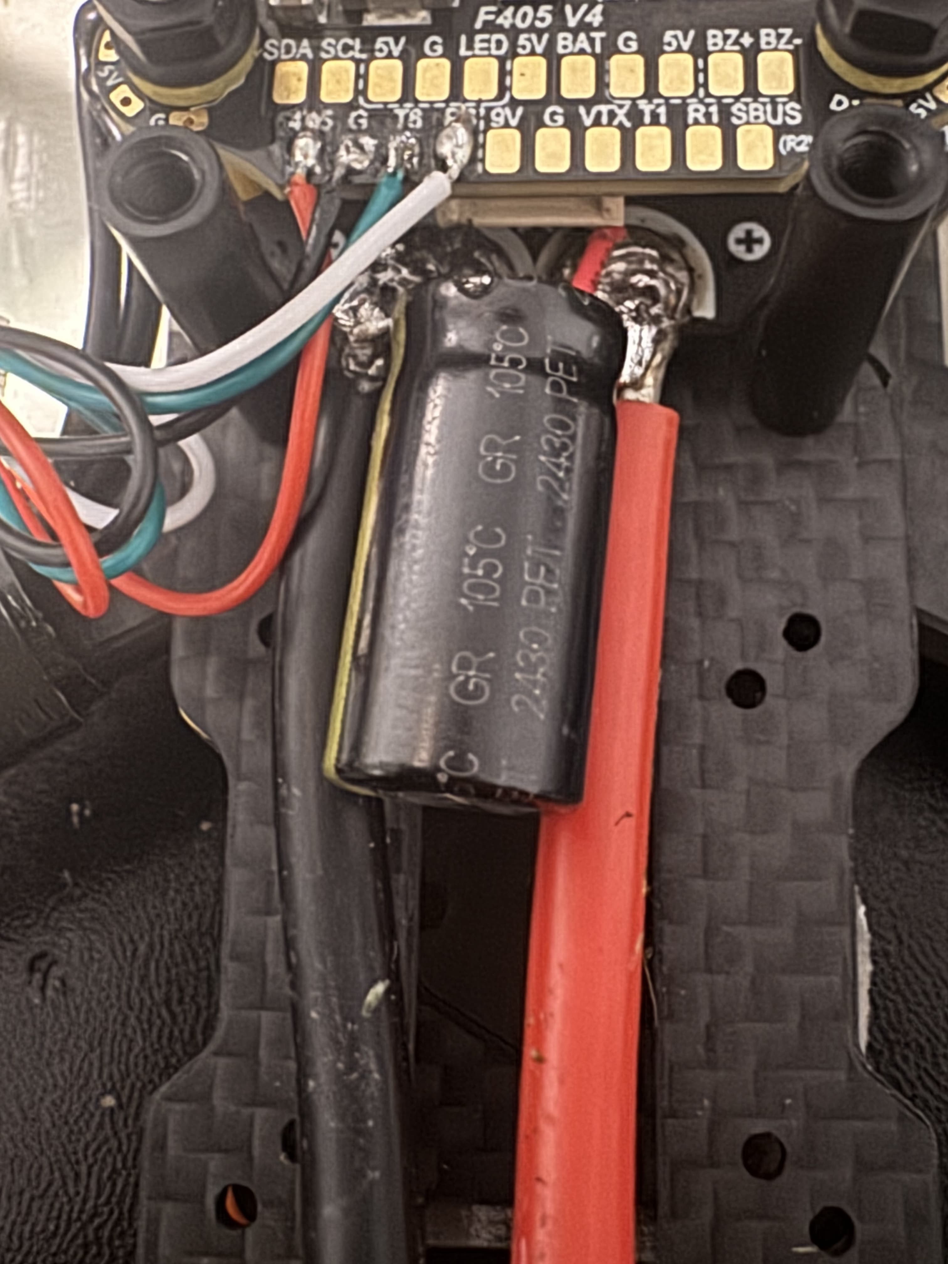 Close-up of the SpeedyBee combo stack's power pads